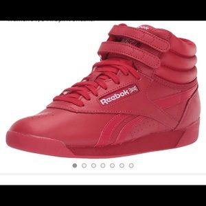 Red women’s hi top Reebok sneaker size 7
